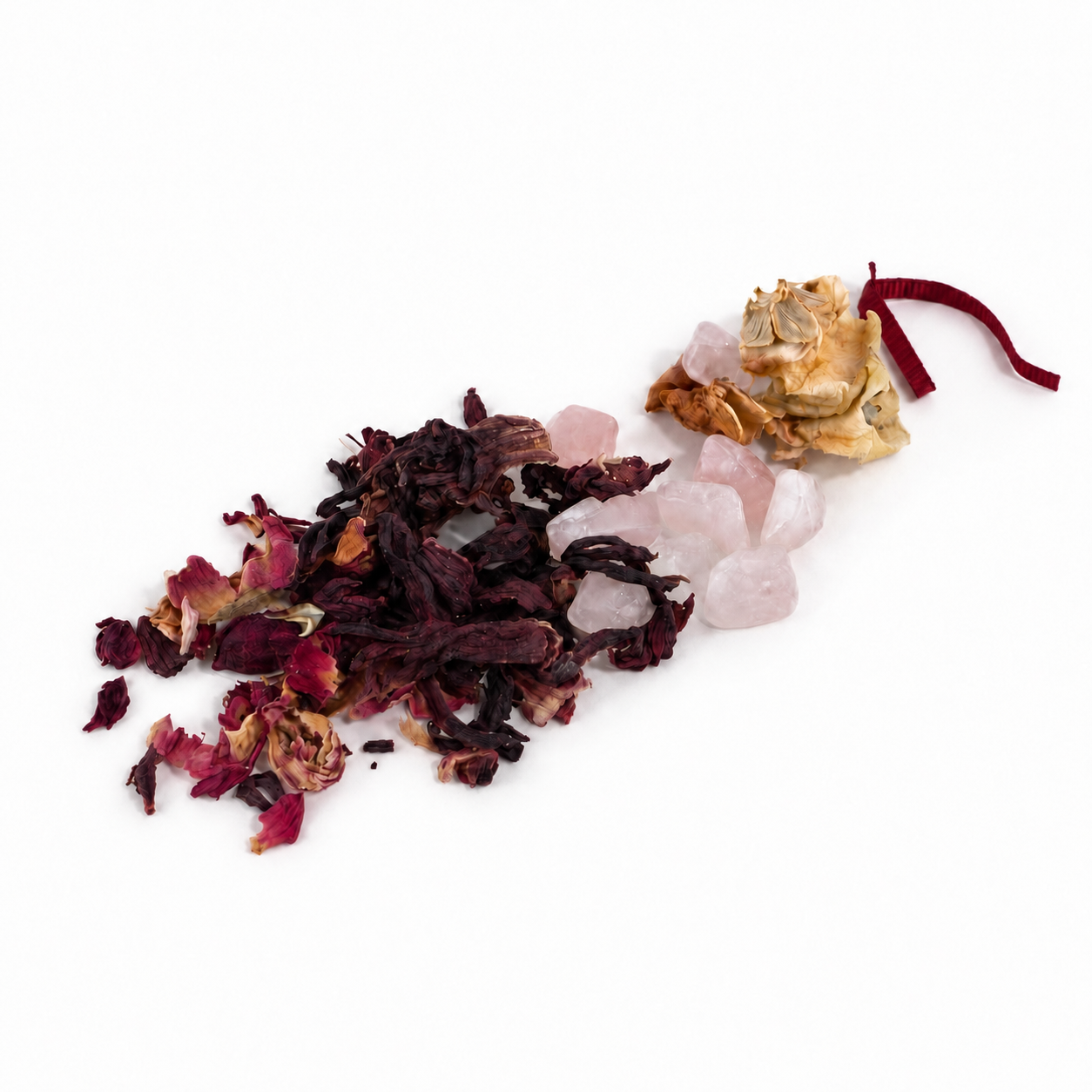 Open A Token of Love intention vial with its colorful dried botanical blend gently scattered beside the glass vial.