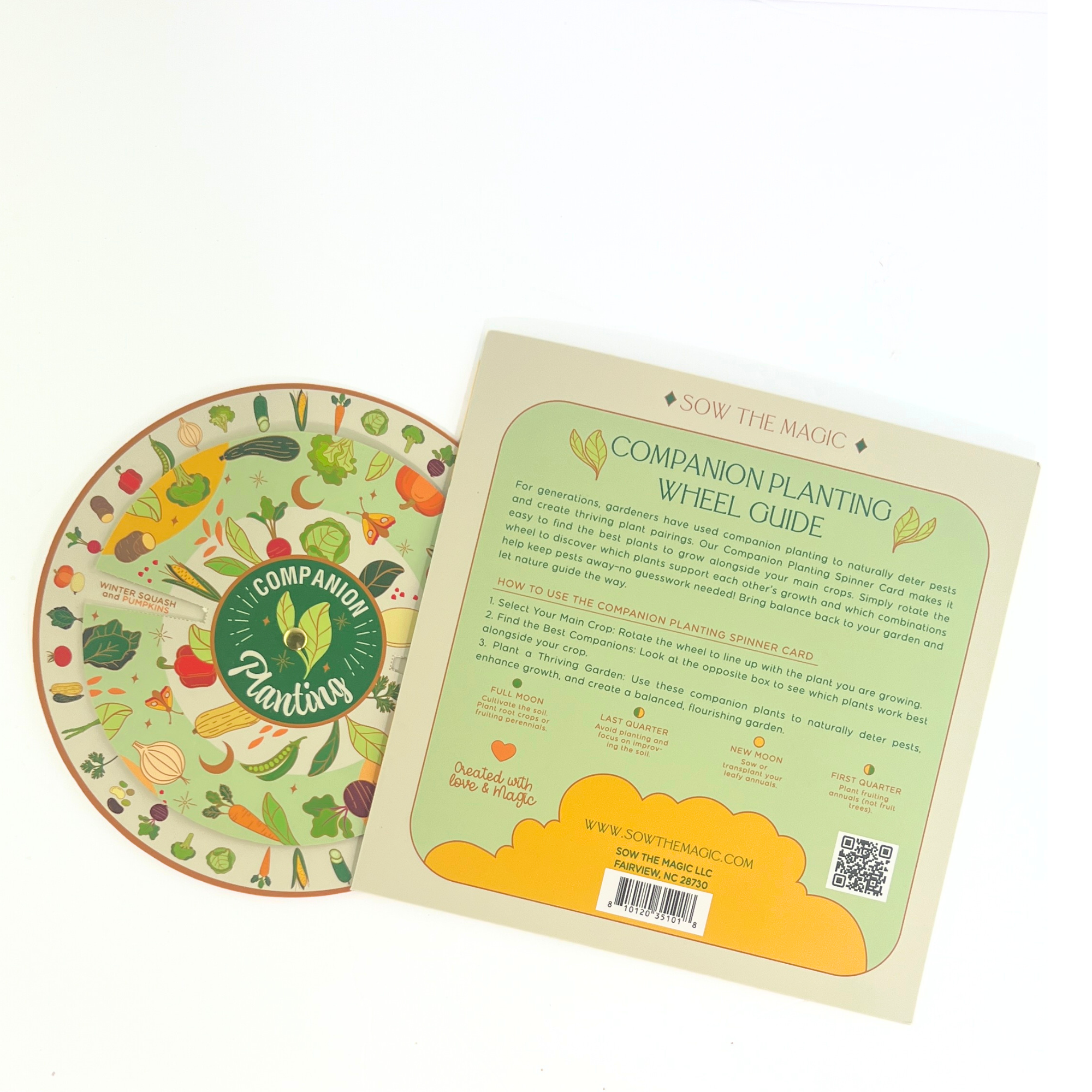 Illustrated companion planting guide with a circular wheel and booklet featuring vegetables such as tomatoes, zucchini, carrots, and lettuce