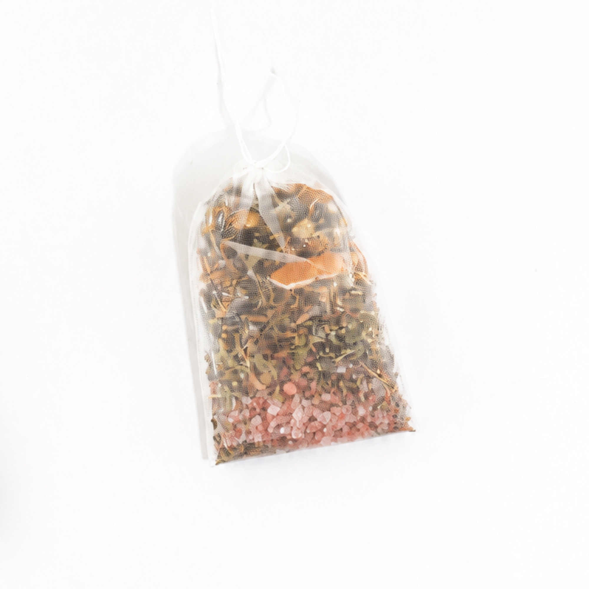 Dandelion Botanical Bath Tea packaged in a reusable organza sachet with dried dandelion flowers, herbs, Himalayan pink salt, citrus peel, and botanical ingredients by Sow the Magic®.