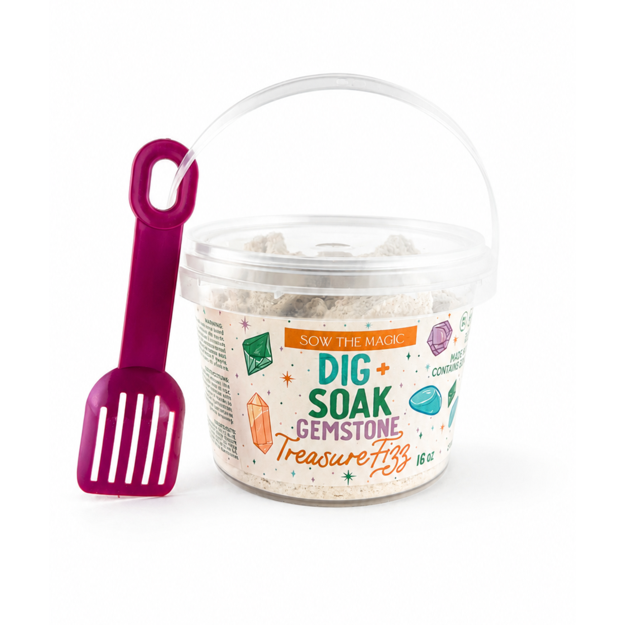 Dig + Soak Gemstone Treasure Fizz bath bucket by Sow the Magic on a clean white background with a soft shadow. The 16 oz bath fizz bucket includes a reusable scoop for digging out hidden gemstone treasures during bath time, making it a fun sensory bath gift for kids.