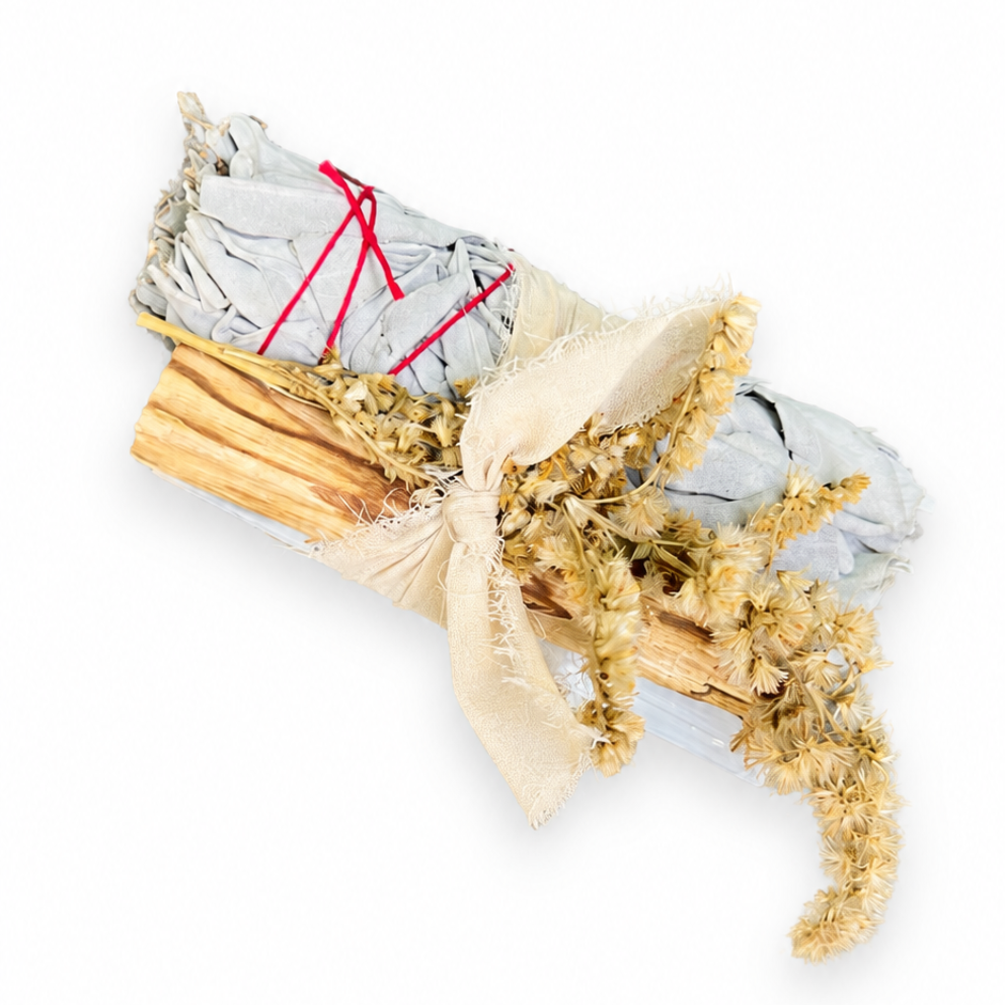 Handcrafted white sage protection bundle with palo santo, selenite crystal, dried goldenrod and cream chiffon ribbon isolated on a white background.