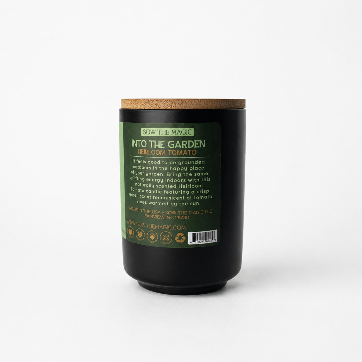 Back label of the Into the Garden Heirloom Tomato candle with product details, barcode and bamboo lid
