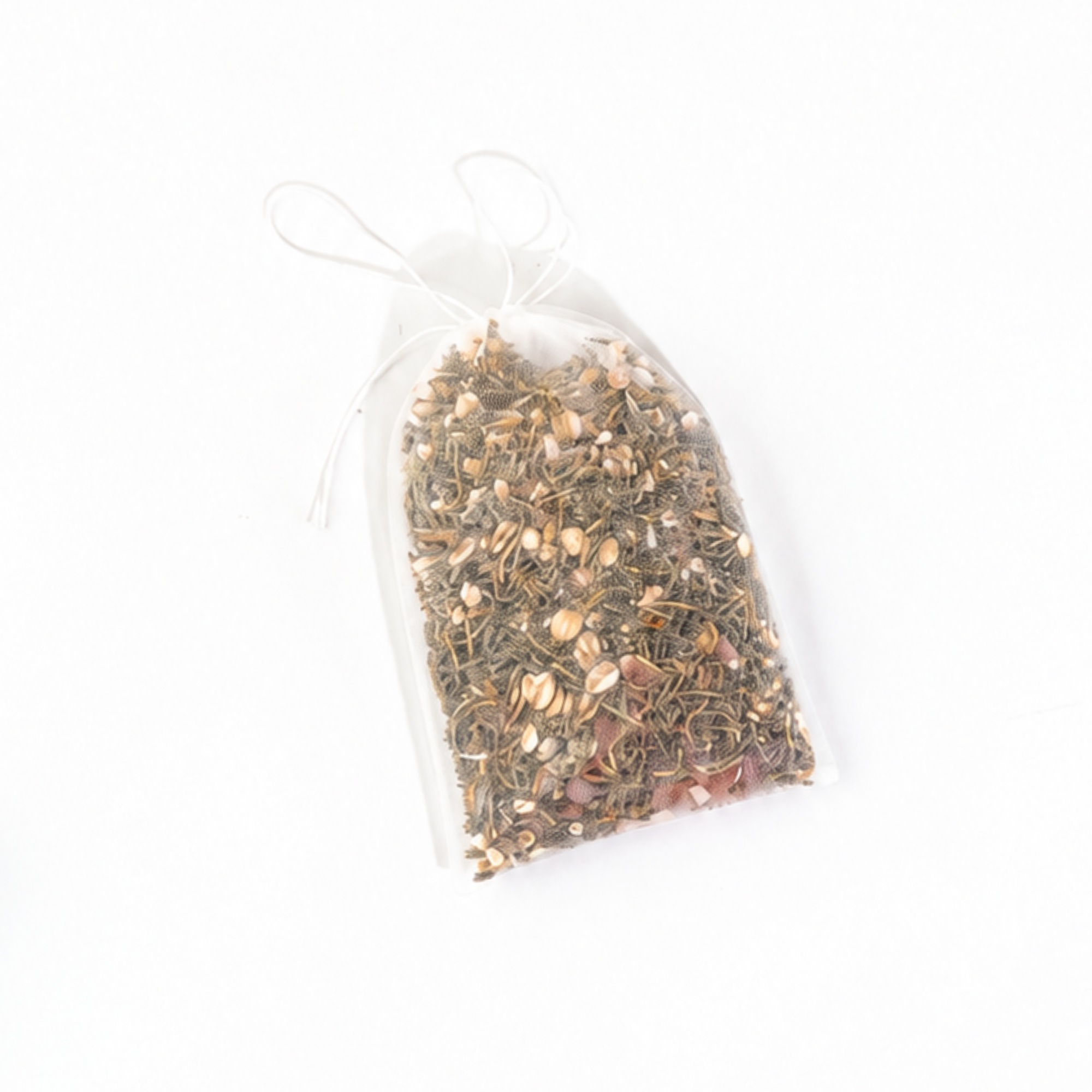 Lavender Botanical Bath Tea packaged in a reusable organza sachet with dried lavender buds, coriander, Himalayan pink salt, and botanical herbs for a soothing bath ritual by Sow the Magic®.