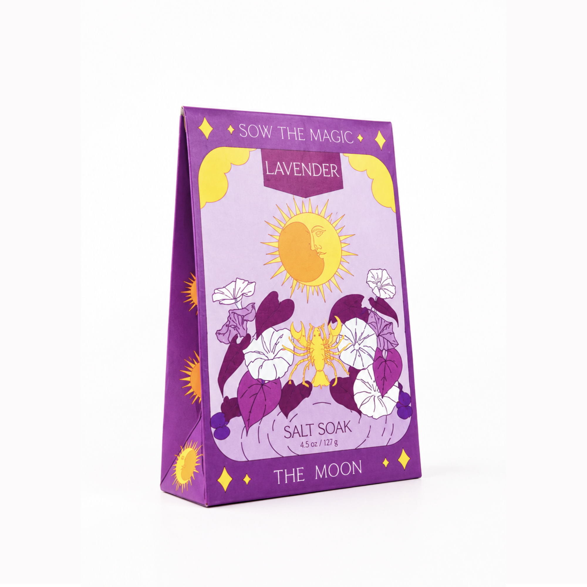 Angled view of Sow the Magic® Lavender Salt Soak – The Moon featuring tarot-inspired botanical artwork and relaxing lavender aromatherapy bath salts in decorative gift-ready packaging on a bright white background.