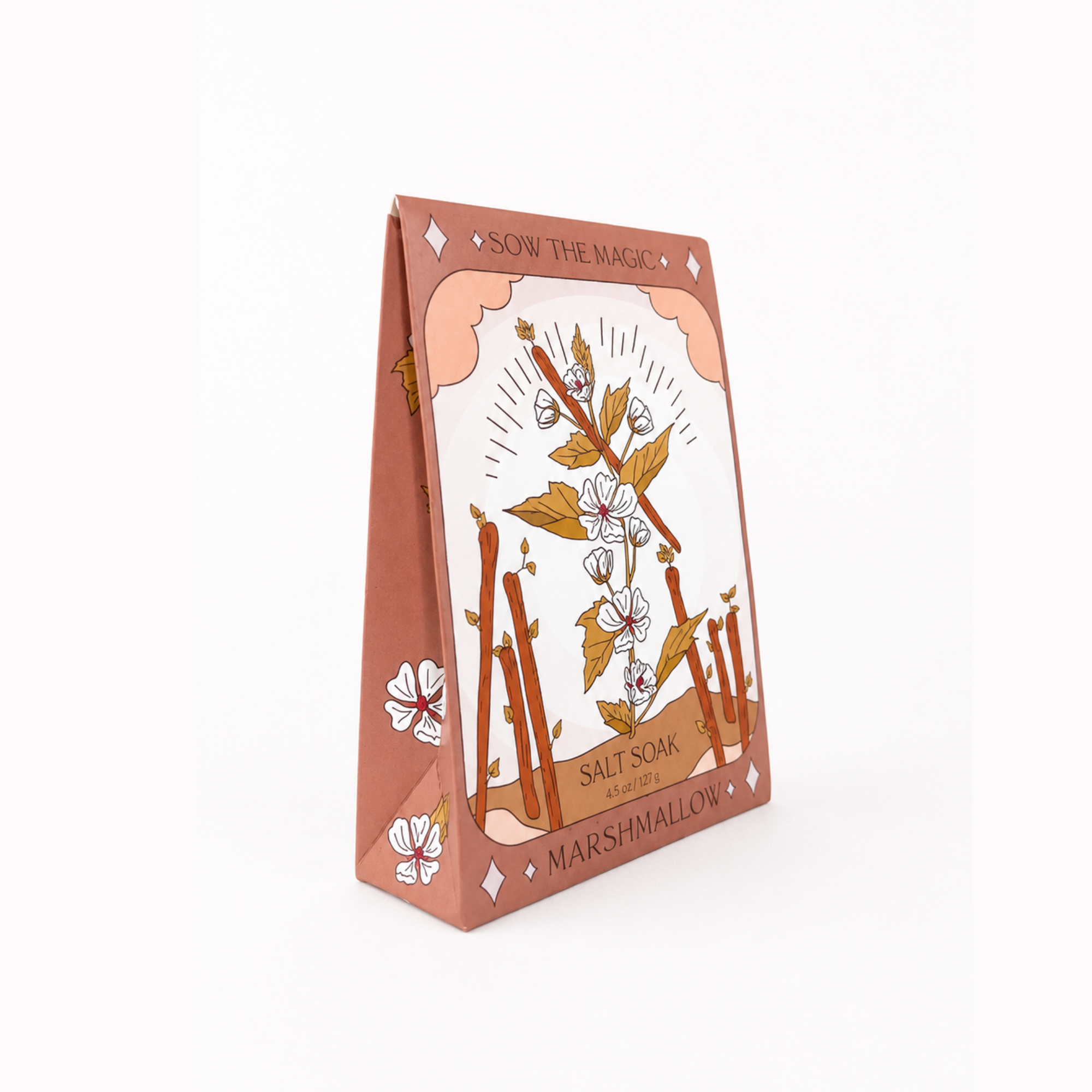Sow the Magic Marshmallow Salt Soak botanical bath salts in a stand-up pouch featuring marshmallow flowers and cinnamon-inspired artwork on a bright white background.