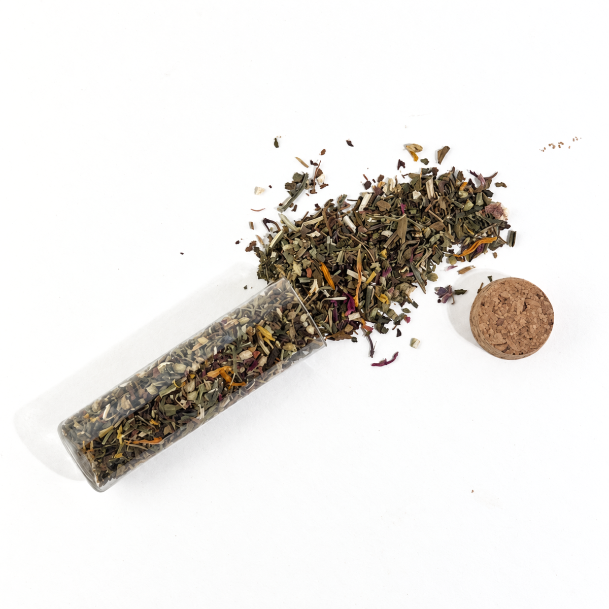 Open Fairy Wishing Dust vial with its cork beside a small spill of dried herbs and flower petals.