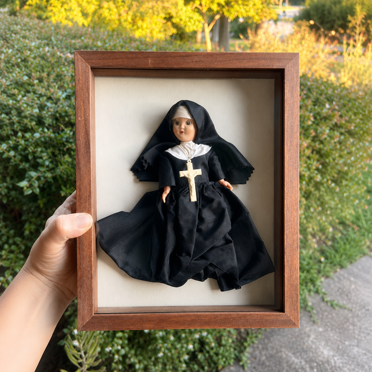 One-of-a-kind vintage nun doll displayed in a wooden shadow box from the Gathered Wonders collection