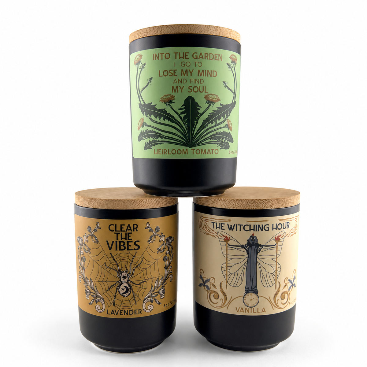 Into the Garden Heirloom Tomato candle displayed with Clear the Vibes Lavender and The Witching Hour Vanilla candles