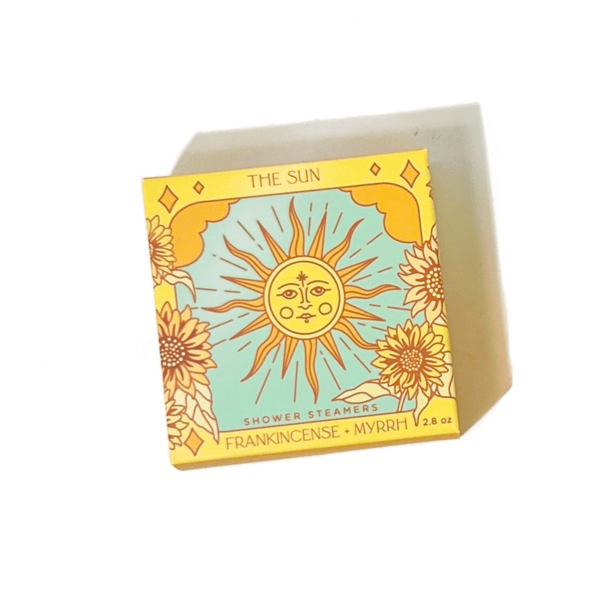 The Sun Shower Steamer Set in Frankincense & Myrrh by Sow the Magic® featuring tarot-inspired botanical packaging with handcrafted aromatherapy shower steamers.