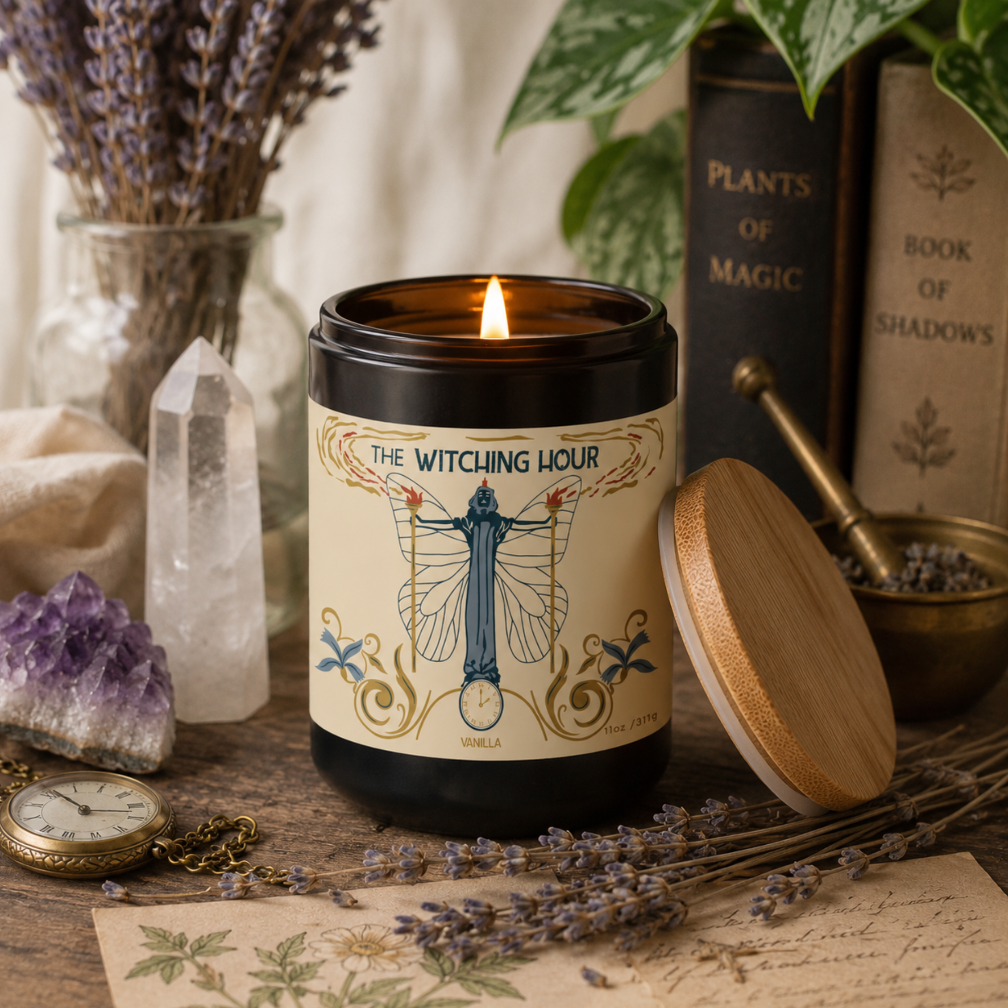 Lit The Witching Hour Vanilla candle by Sow the Magic styled in a cozy witch-inspired setting with dried lavender, amethyst and clear quartz crystals, vintage books, a pocket watch and botanical décor. The black glass candle with a bamboo lid creates a warm, magical atmosphere perfect for meditation, relaxation and seasonal home décor.