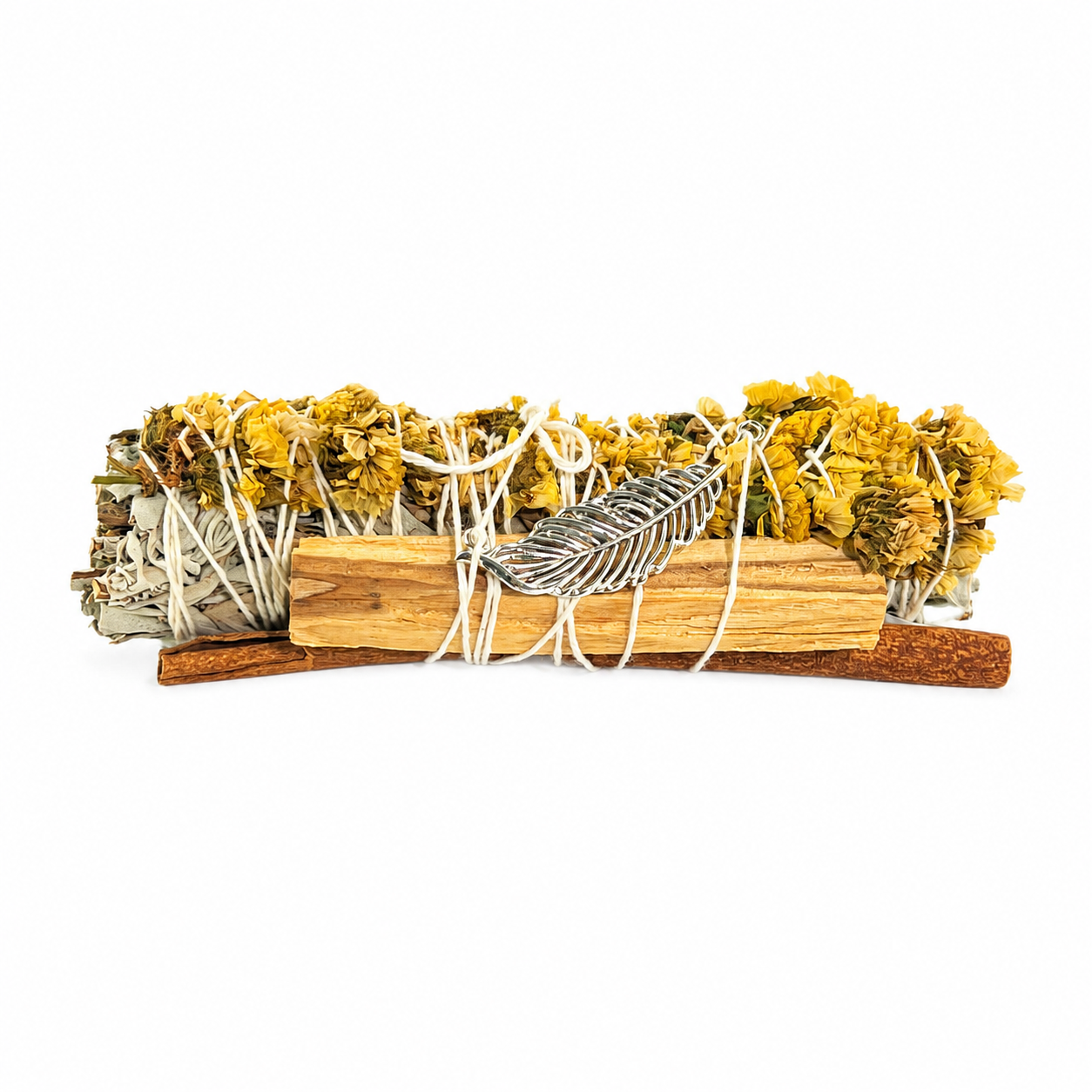 Handcrafted White Sage smudge stick wrapped with Palo Santo, yellow sinuata flowers and a silver feather charm. Handmade botanical ritual bundle on a bright white background by Sow the Magic®.