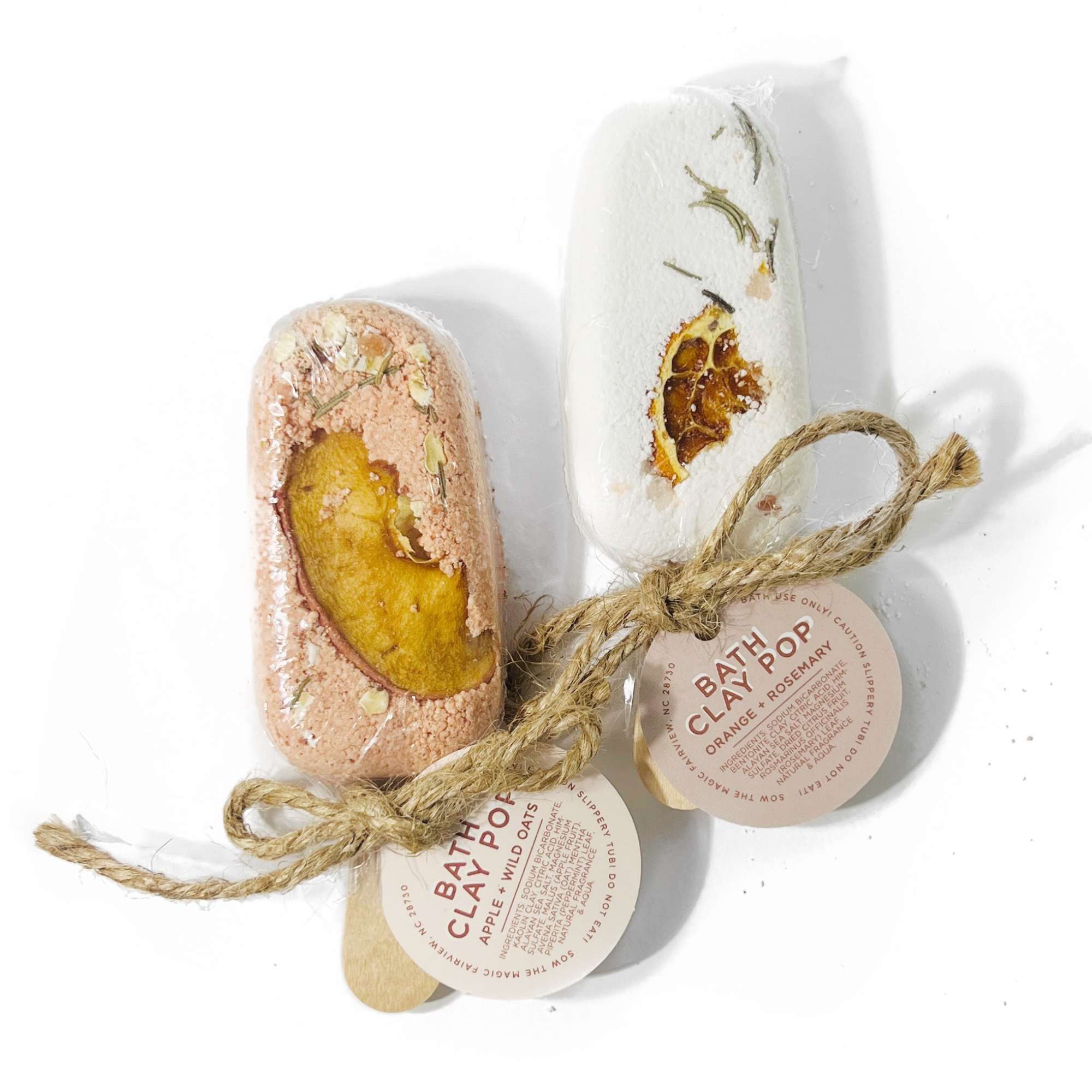 Bath Clay Pop with botanical details on white background