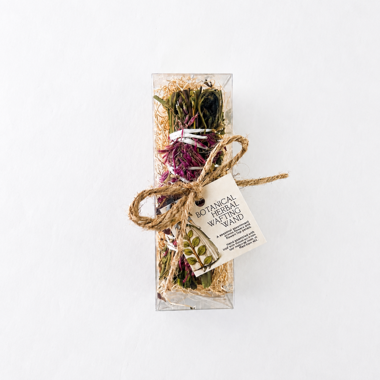 Botanical herbal wafting wand packaged in a clear gift box with dried flowers, twine and product tag