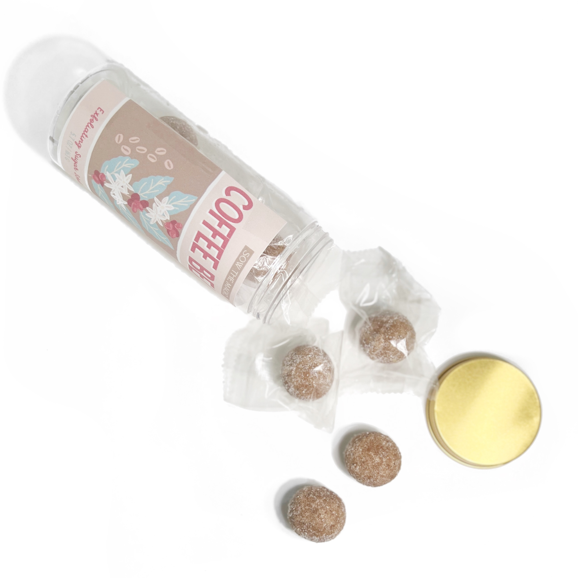 Coffee Bean sugar scrub balls spilling from open jar