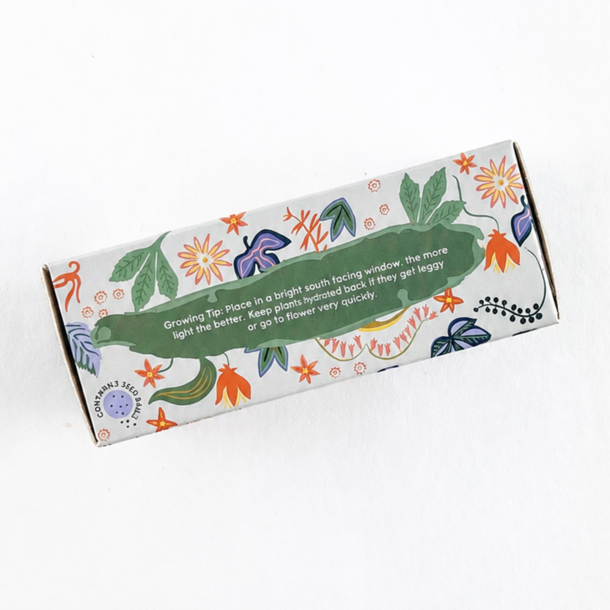 Culinary seed ball planting set packaging displaying growing tips and botanical artwork