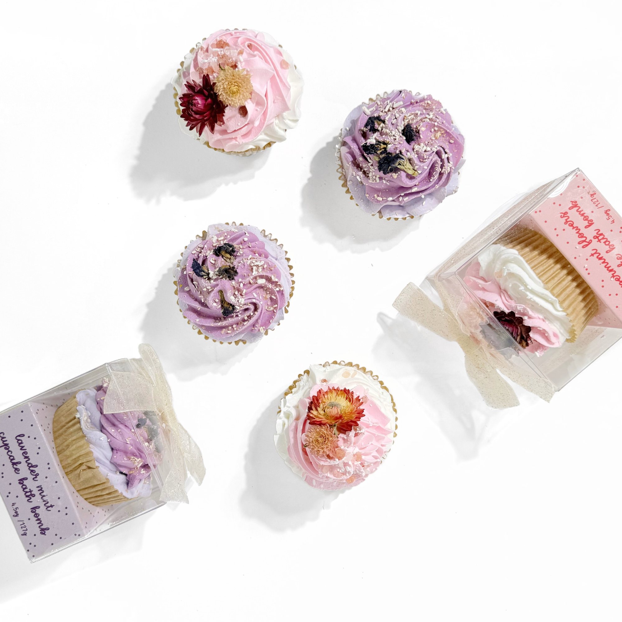 Lavender Mint and Peppermint Flowers Cupcake Bath Bombs arranged in pastel flat lay display