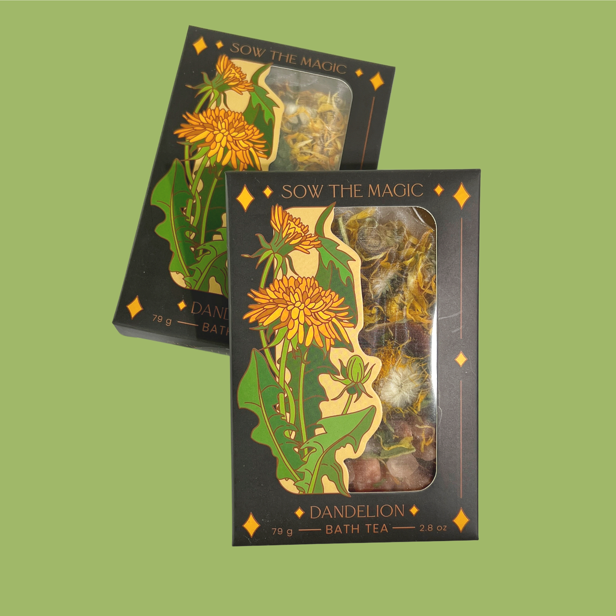 Two Dandelion Tarot Botanical Bath Tea Boxes by Sow the Magic on green background, highlighting botanical art and herbal blend.