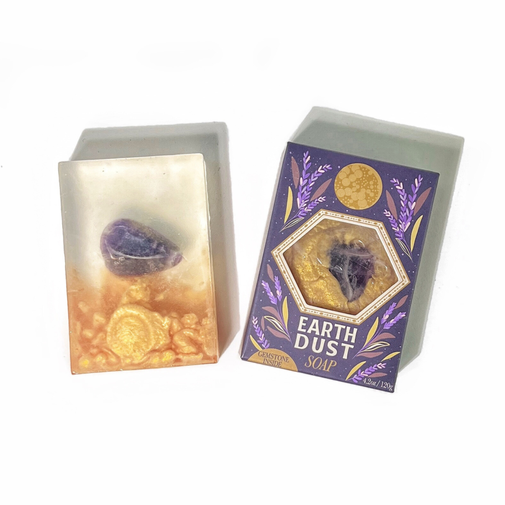 Earth Dust Gemstone Soap unboxed beside packaging, revealing translucent bar with embedded amethyst crystal.