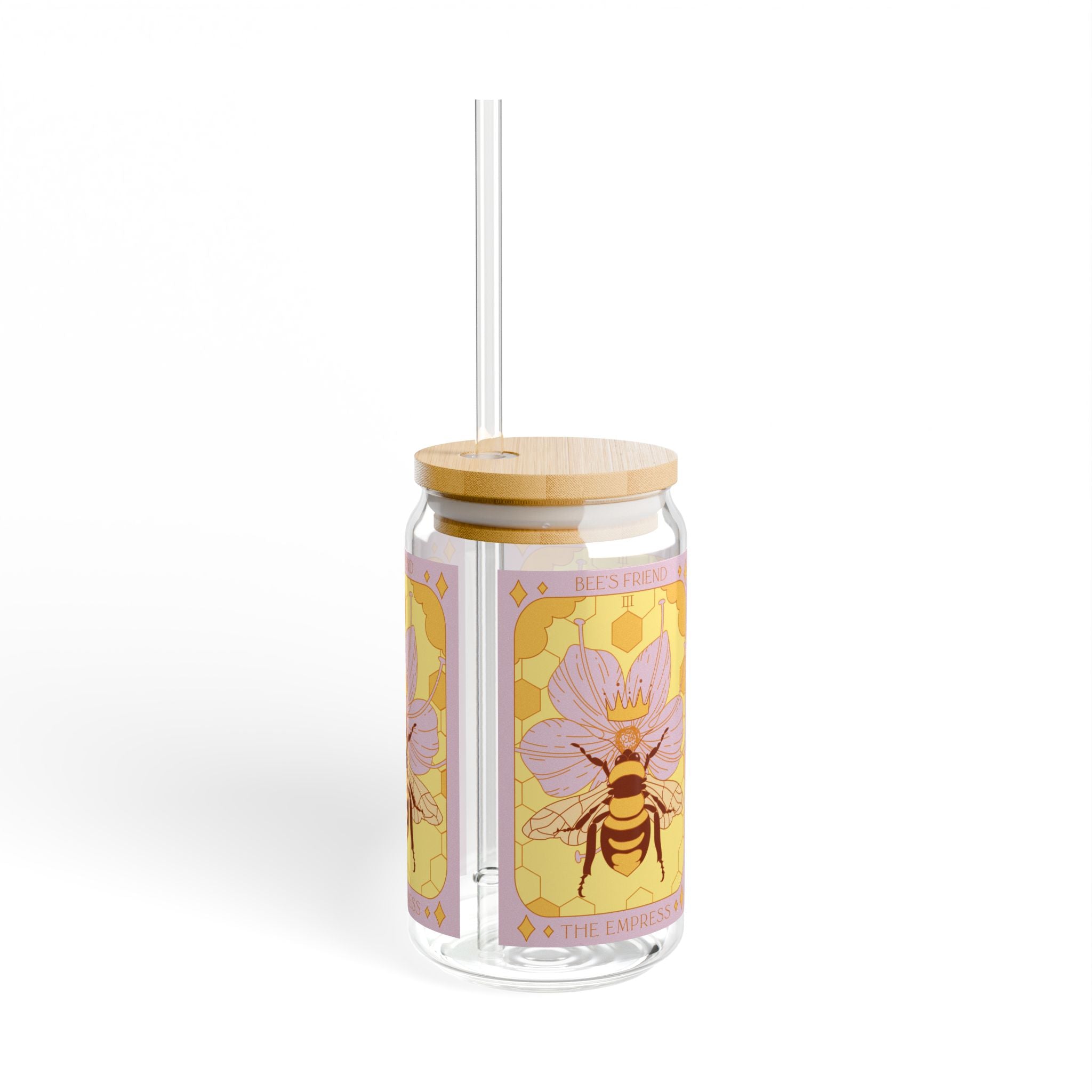 Clear glass tumbler featuring Sow The Magic Empress Bee botanical tarot artwork with bamboo lid and straw