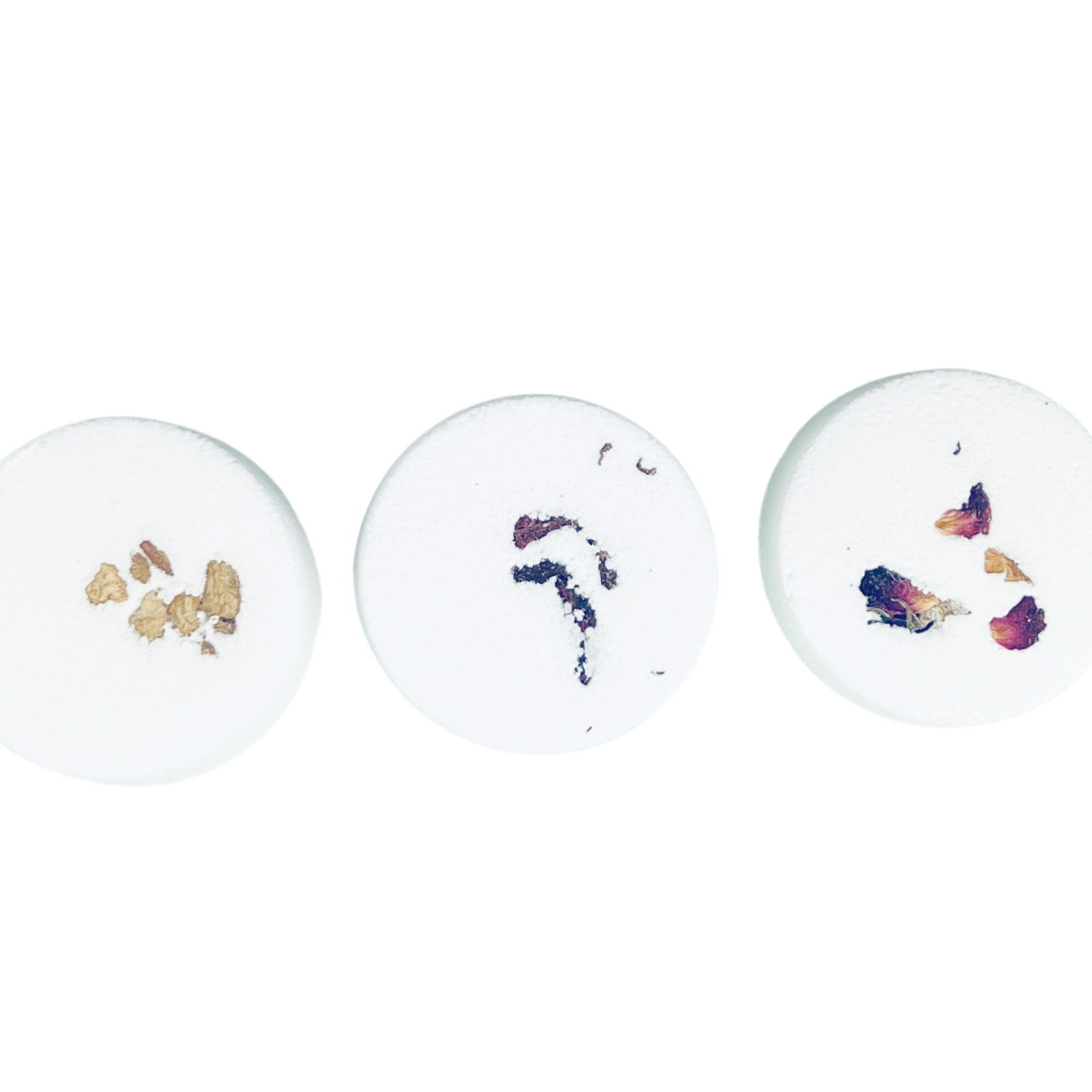 Close-up of single Floral Tarot Shower Steamer featuring dried flower botanicals