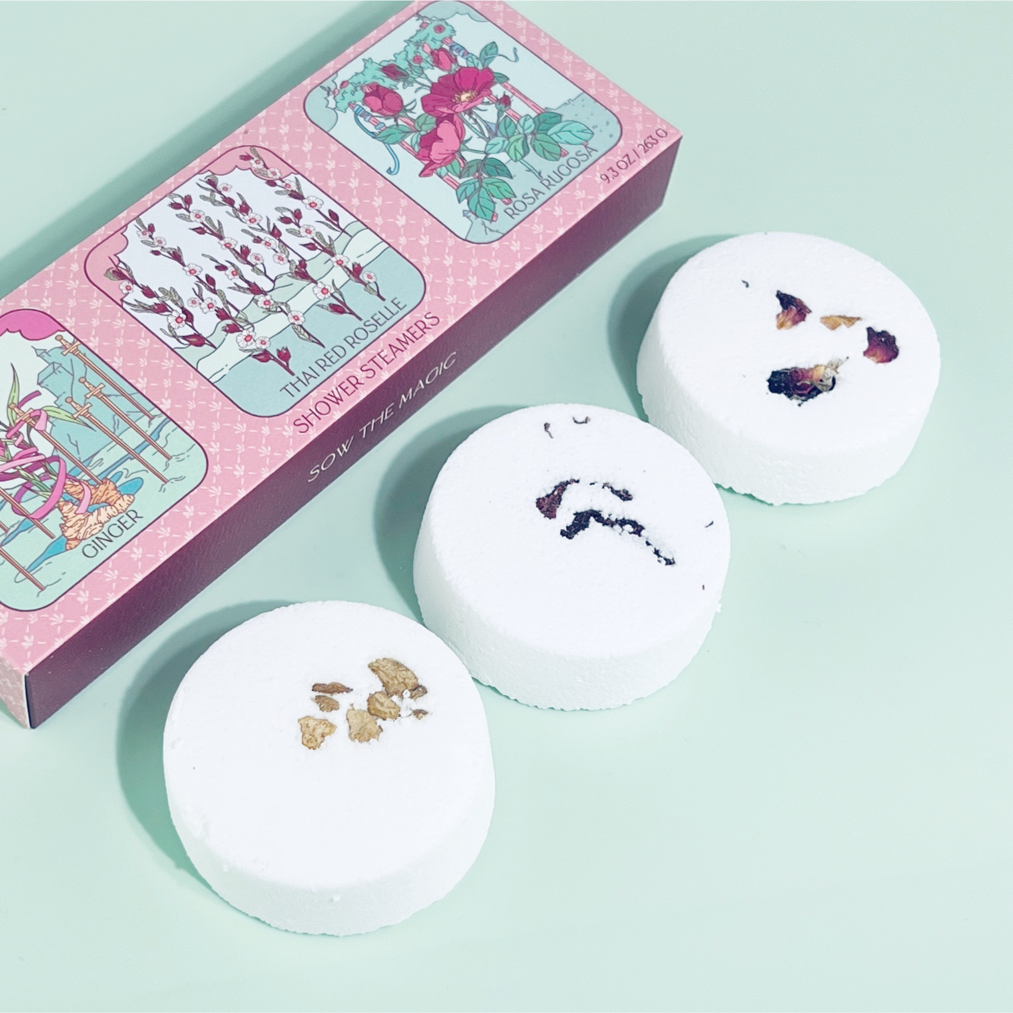 Floral Tarot Shower Steamer Trio packaging with three botanical steamers arranged on soft green background