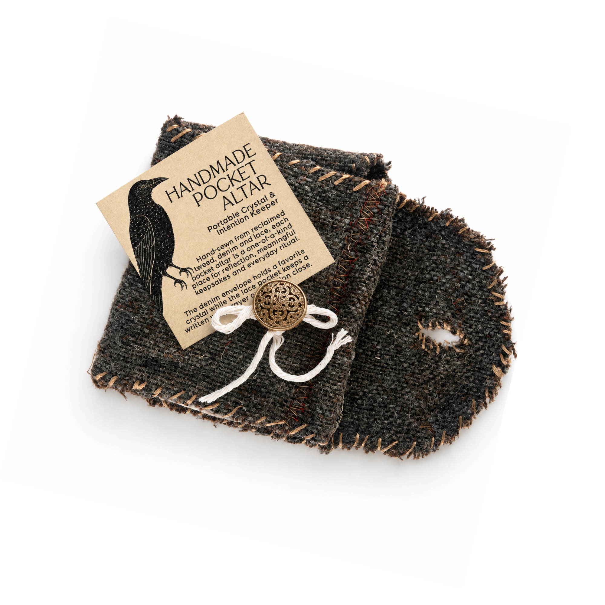 Folded handmade pocket altar with raven product tag, reclaimed tweed fabric and hand-sewn details