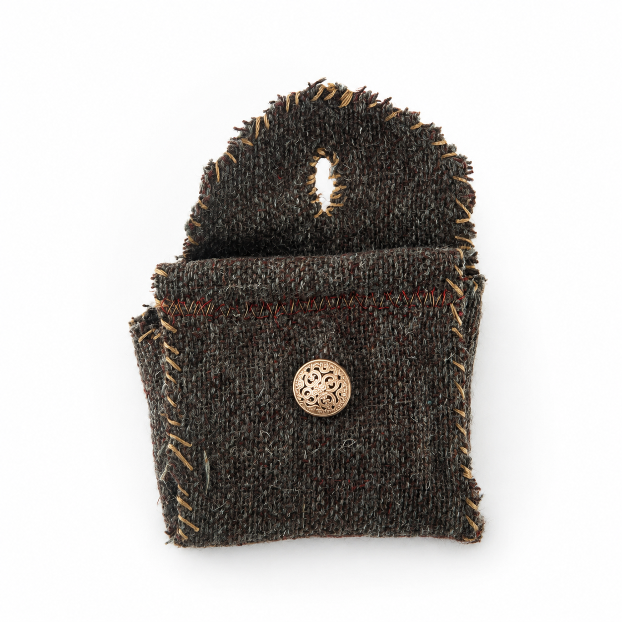 Back view of an open handmade pocket altar showing reclaimed tweed, hand stitching and hanging loop
