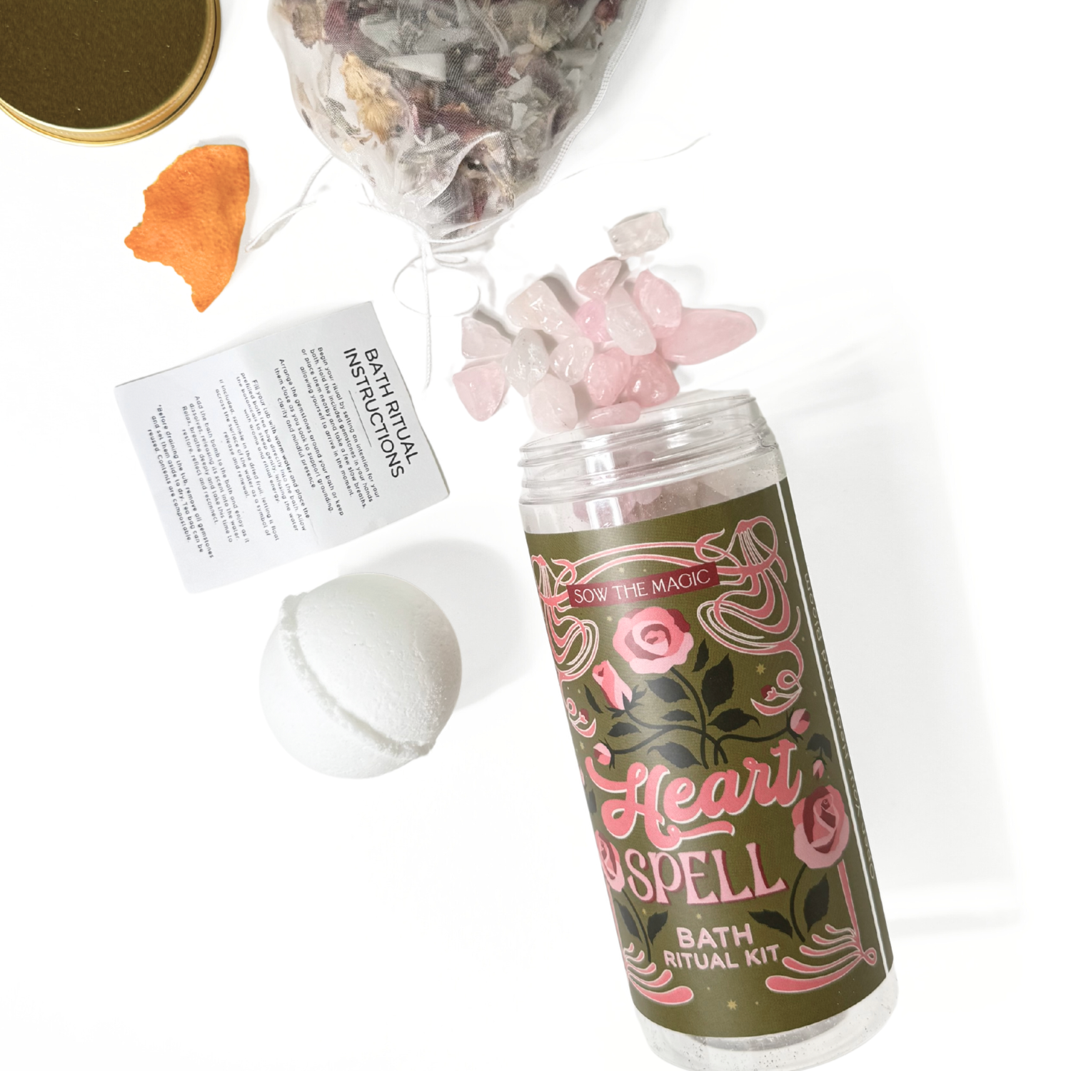 Heart Spell bath ritual kit with rose quartz crystals, bath bomb, botanicals tea bag, and jar by Sow the Magic
