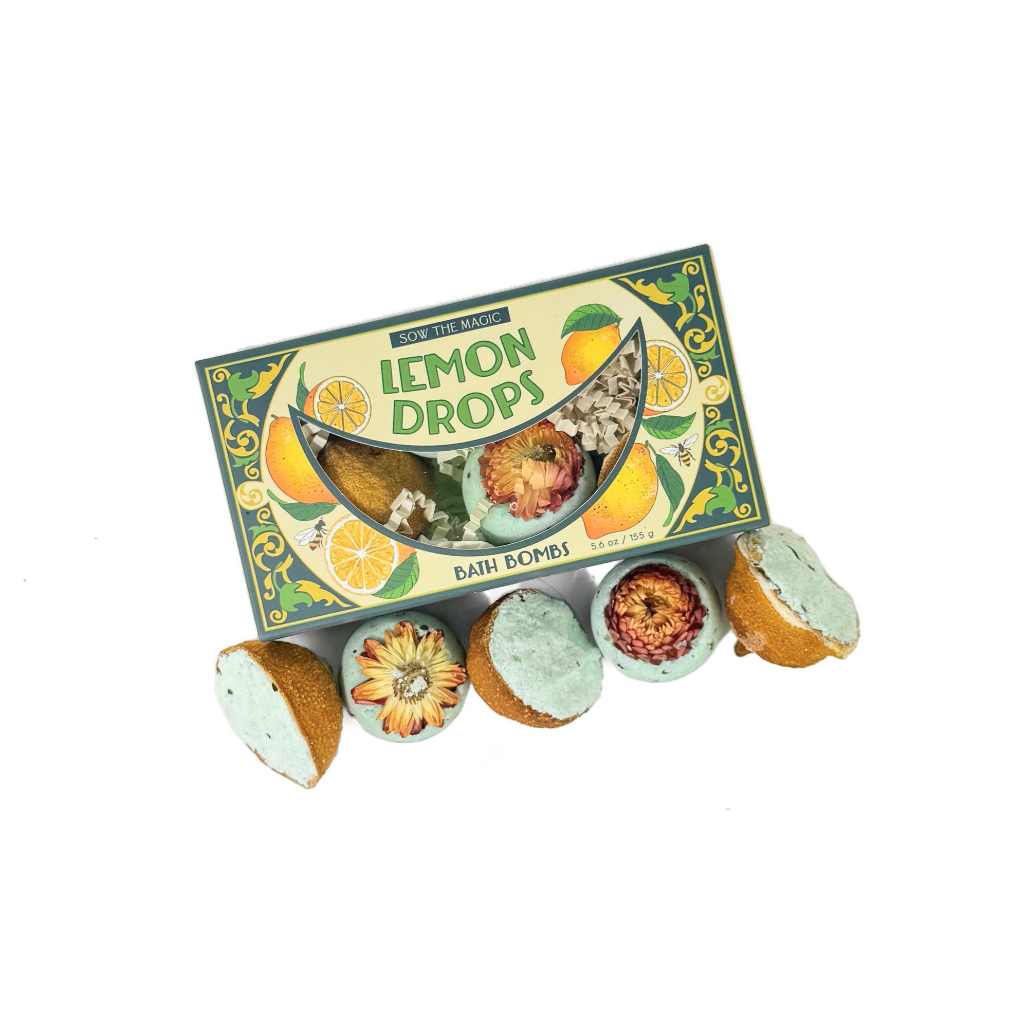 Lemon Drop Bath Bomb Gift Set surrounded by handmade citrus bath bombs infused with dried lemons and flowers