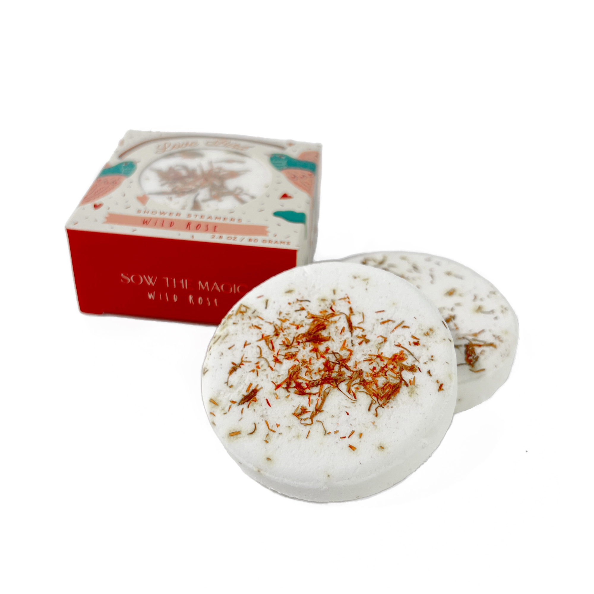 Two wild rose shower steamers with petals beside Love Bird box by Sow the Magic