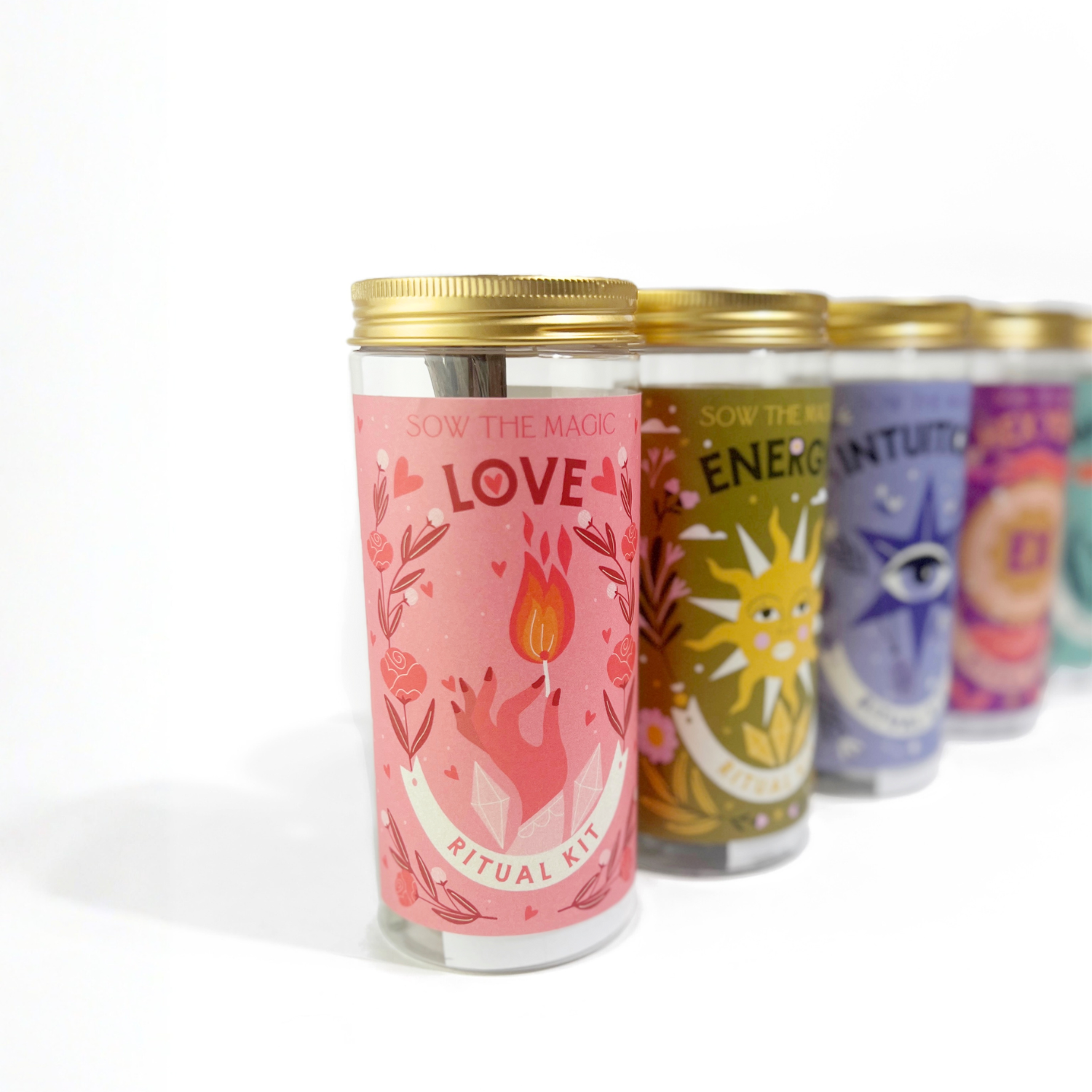 Close-up of Love Ritual Kit jar with pink label and heart flame illustration by Sow the Magic