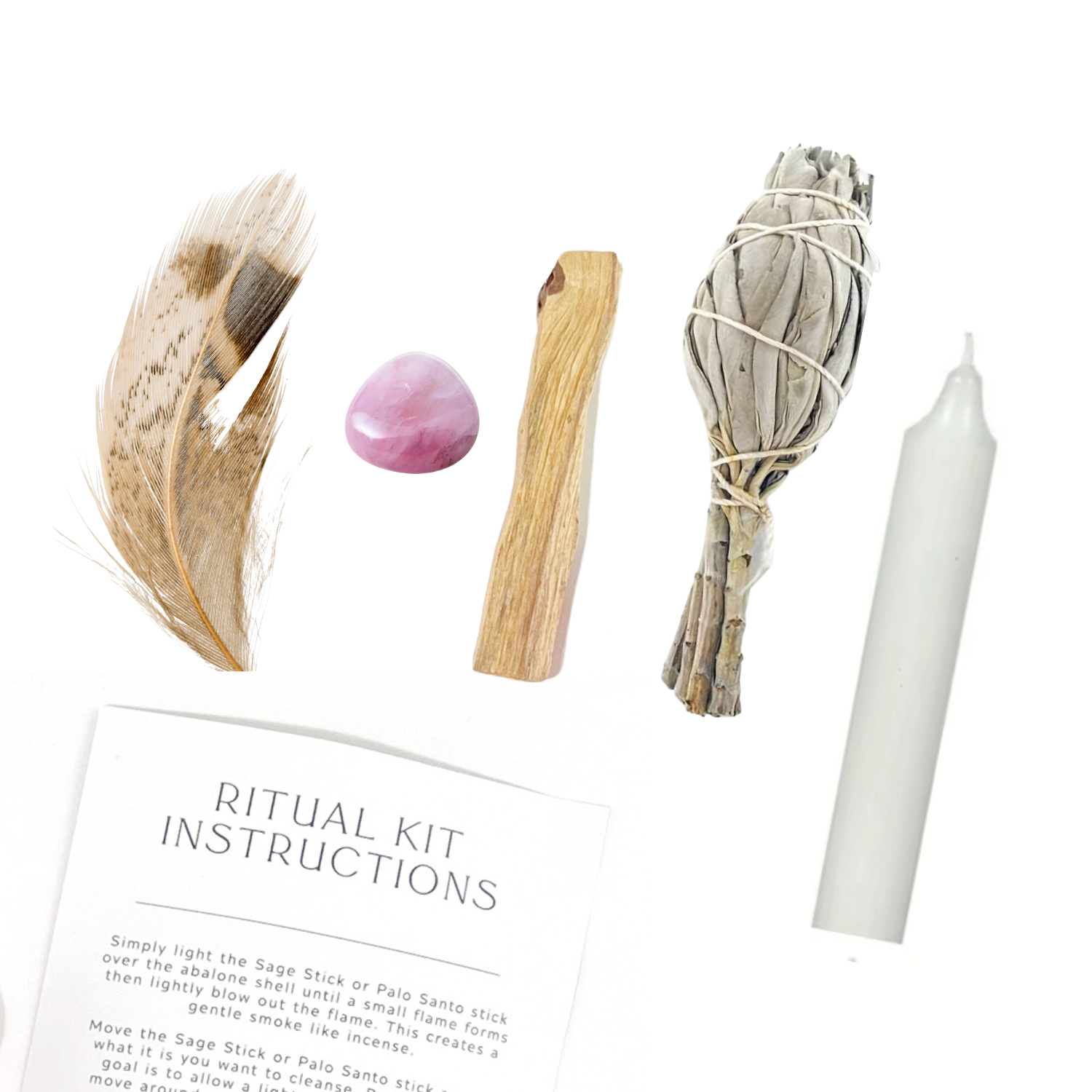 Flat lay of Love Ritual Kit items including feather, sage bundle, Palo Santo, Rose Quartz, and candle