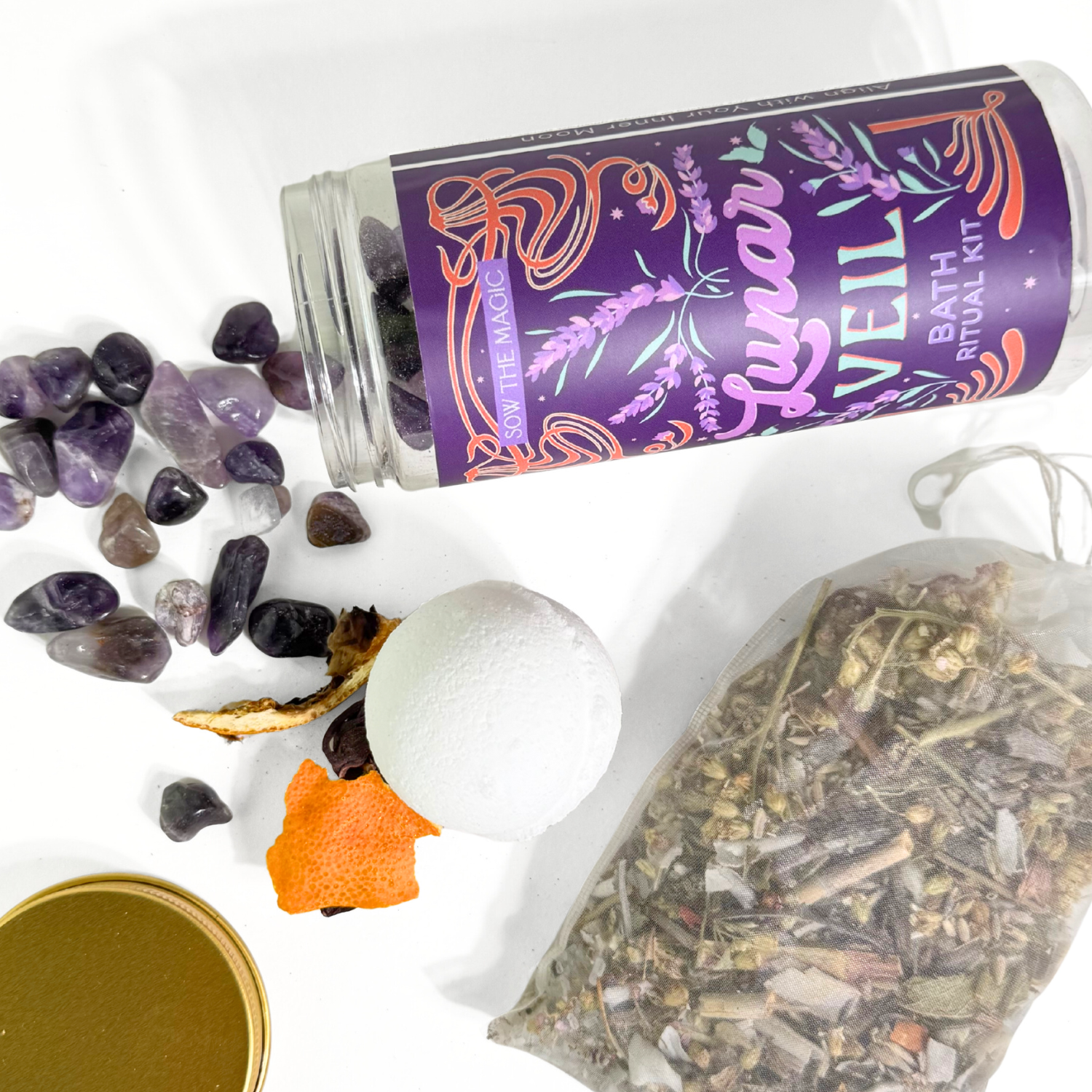 Lunar Veil bath ritual kit with amethyst crystals, bath bomb, dried botanicals tea bag, and jar on white background