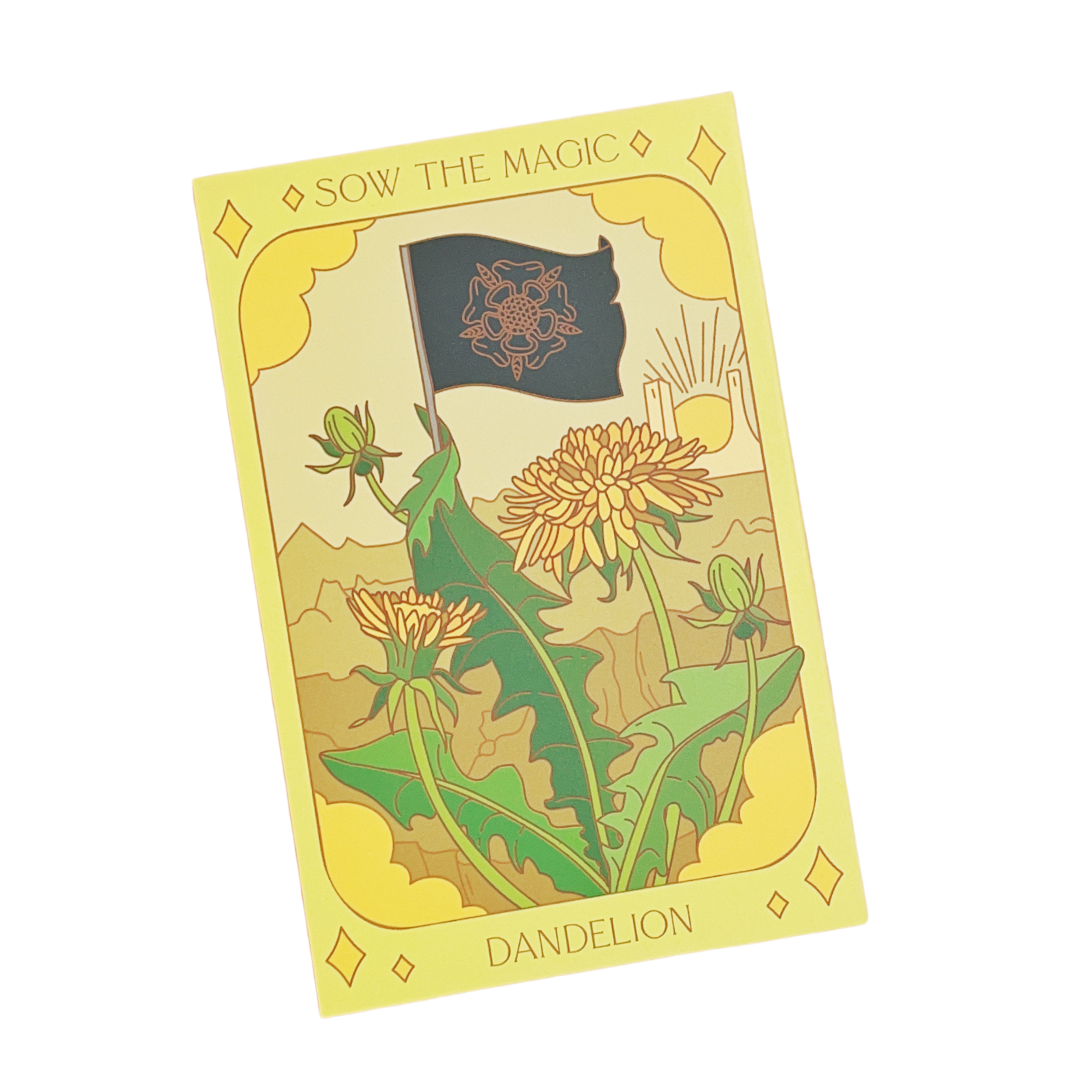 Close-up of the front design of a Sow the Magic dandelion seed packet, featuring an artistic illustration of the dandelion plant.