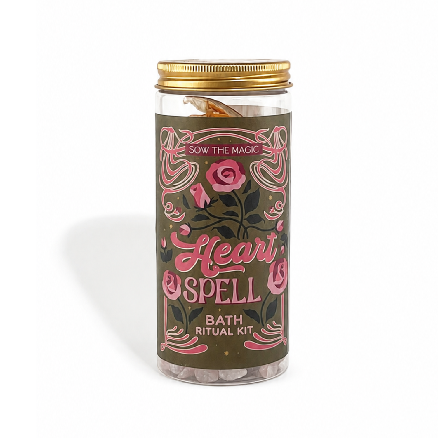 Heart Spell Bath Ritual Kit by Sow The Magic with rose quartz crystals and dried rose petals in a gold and pink jar for self-love and heart-healing rituals.