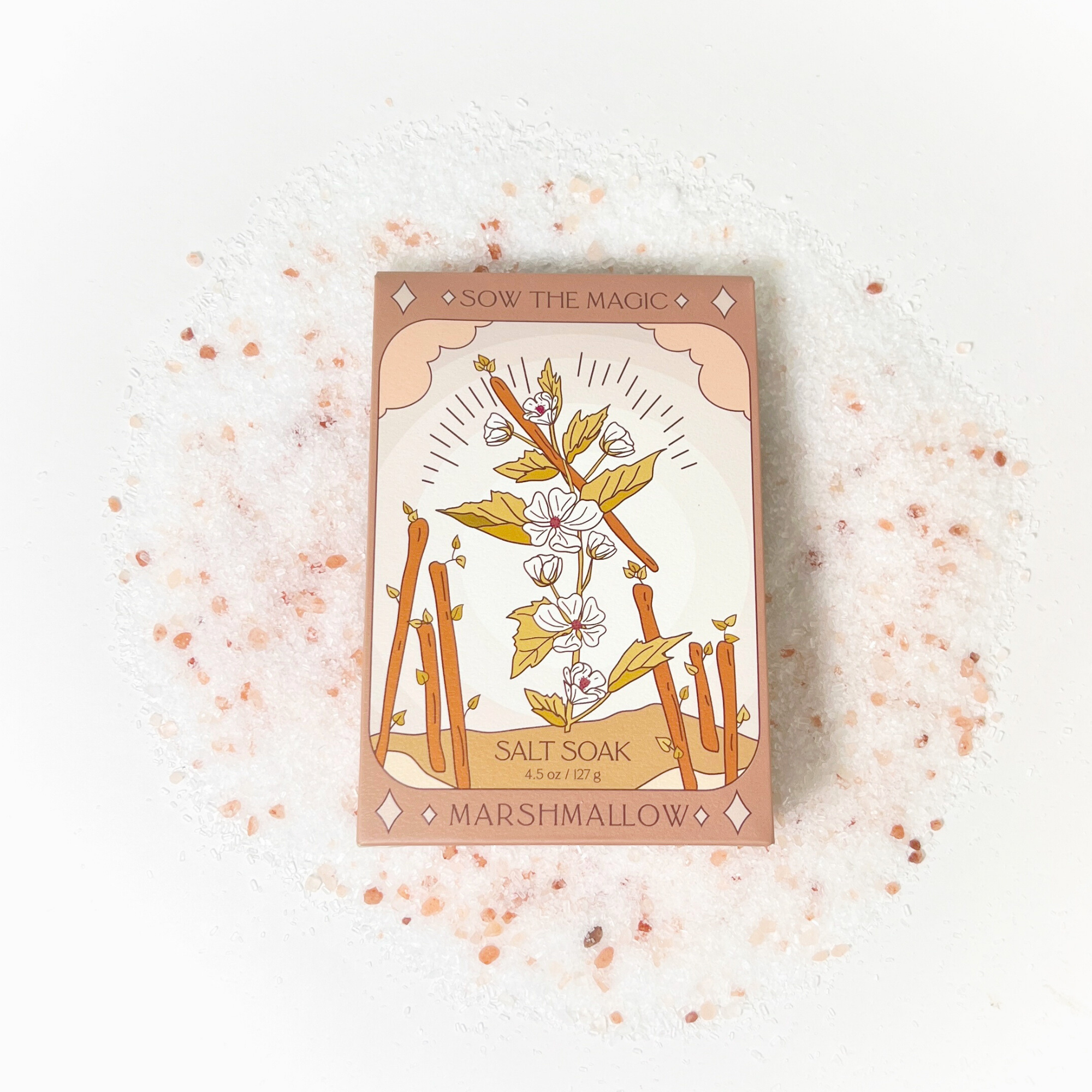 Marshmallow Salt Soak tarot box displayed on white background surrounded by pink Himalayan salt