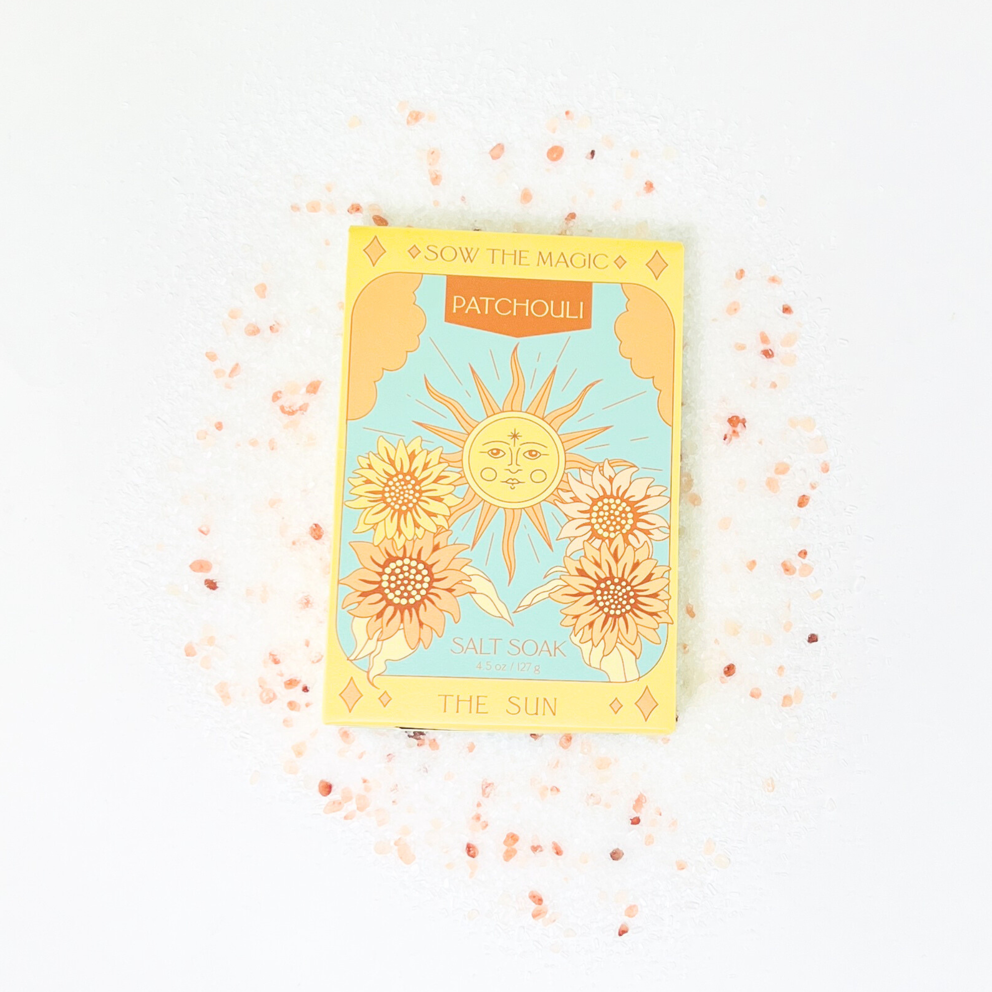 Patchouli Salt Soak tarot card design on white background surrounded by Himalayan pink salt crystals