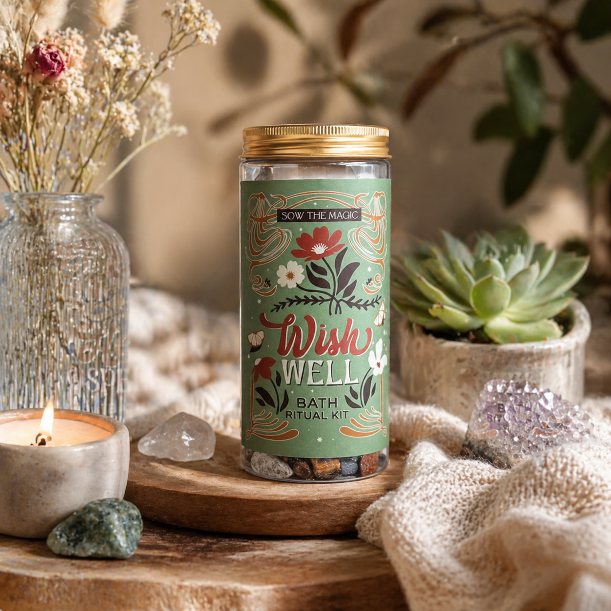 Wish Well bath ritual kit in cozy lifestyle setting with candle, crystals, dried flowers and succulent
