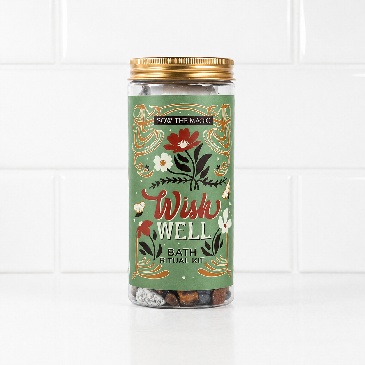 Wish Well bath ritual kit jar with green floral label against white tile background
