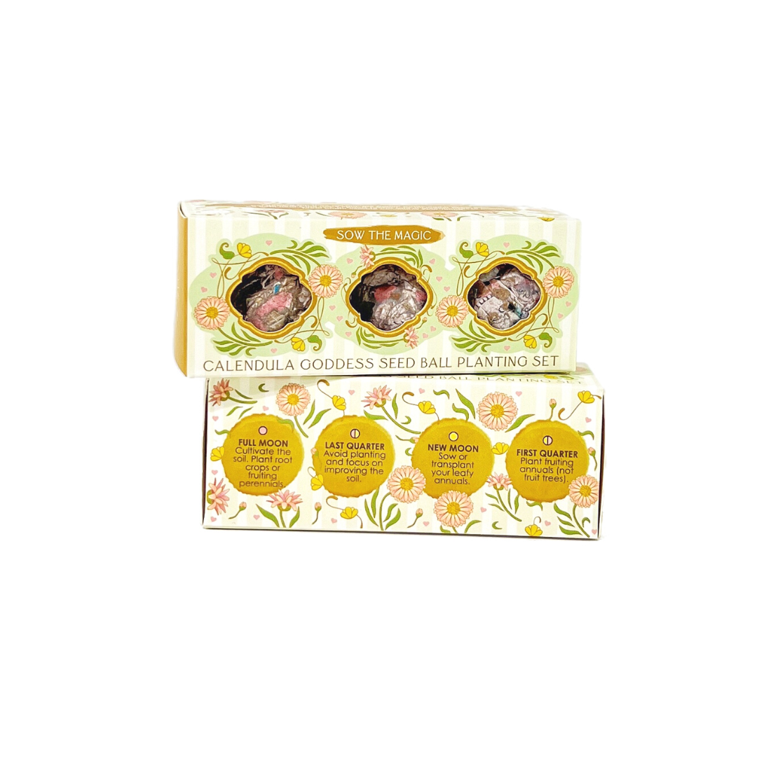 Open Calendula Goddess Mini Seed Ball Gift Box Set featuring three handmade calendula seed balls