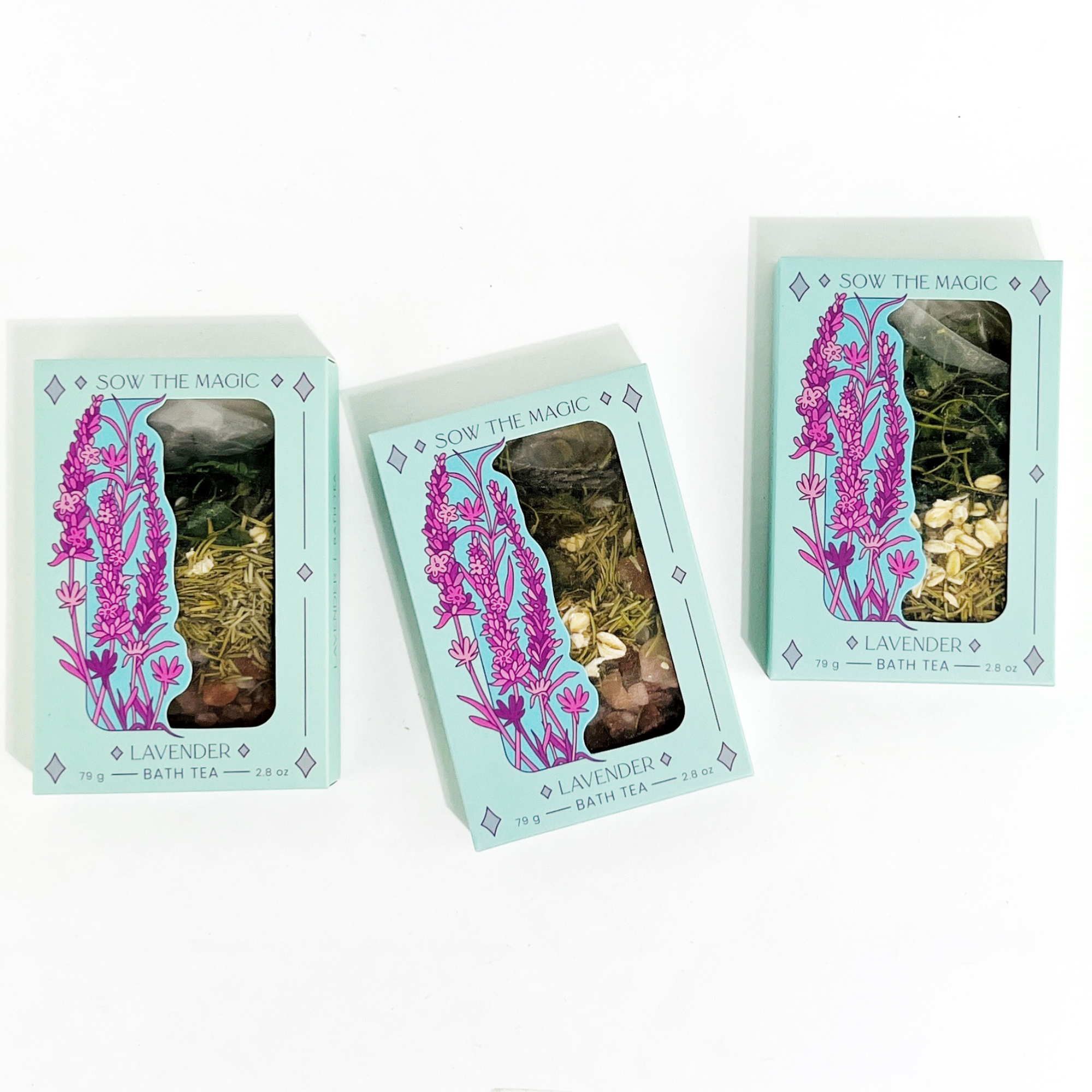 Three Lavender Lovers Tarot Botanical Bath Tea Boxes by Sow the Magic on white background showing floral packaging and herbal mix.